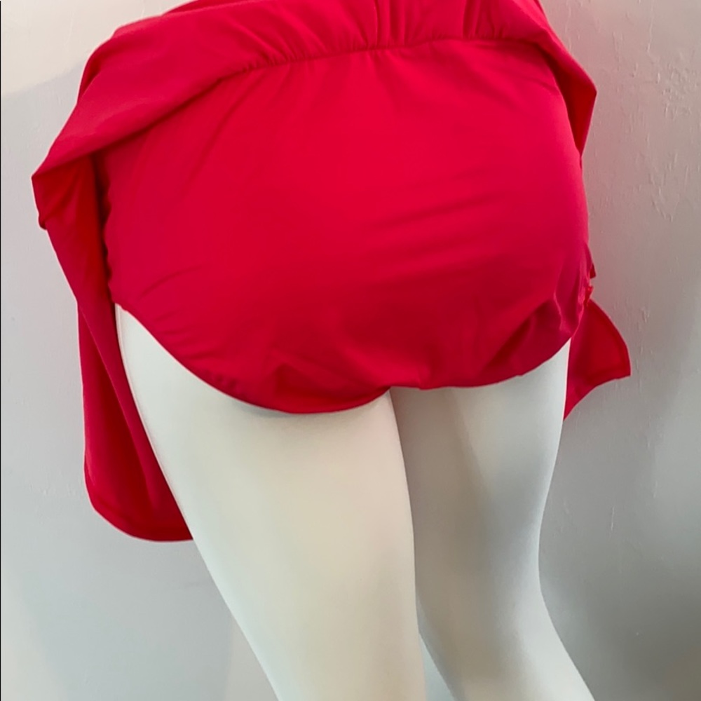 26W Lava pink swim shorts with a slit on the side